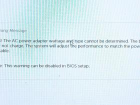 在Bios关闭戴尔笔记本电池警告！自检的电源适配器设置